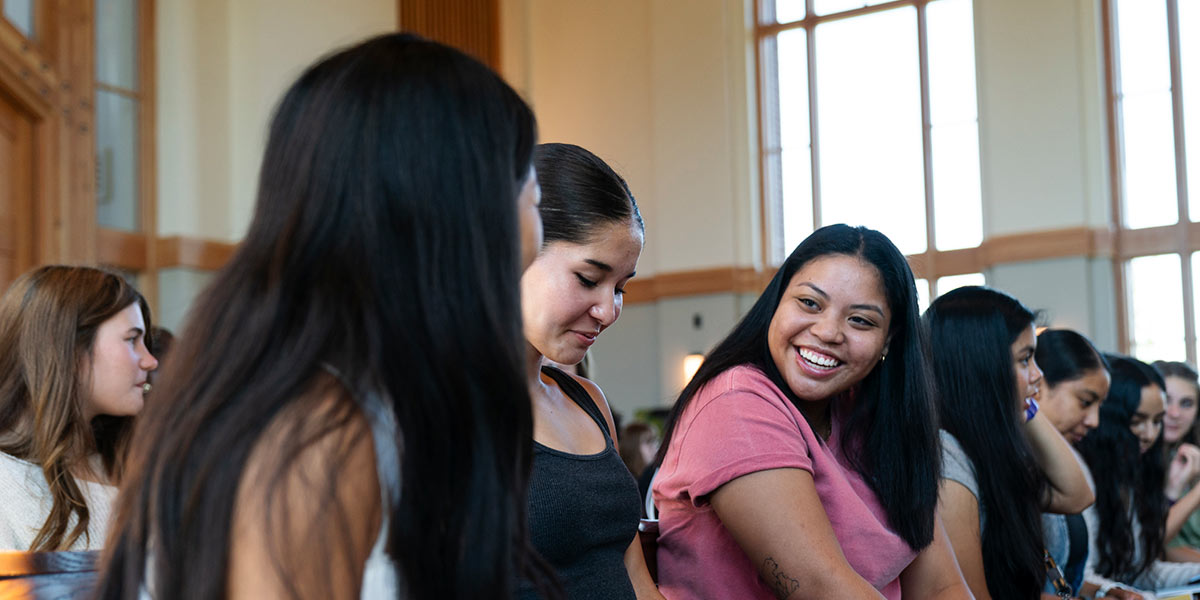 students joyfully discussing chapel