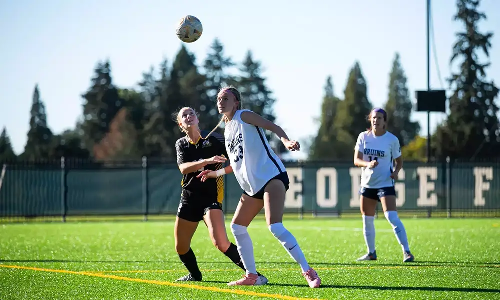 Carly playing soccer