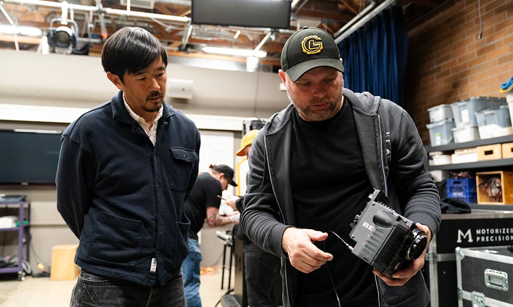 Alex Chung with robot arm camera