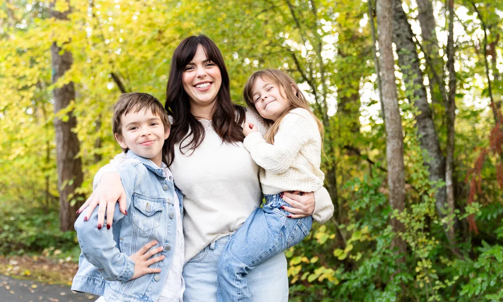 Esther Davido and her 2 children smiling