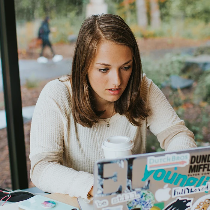 Student studying on a table