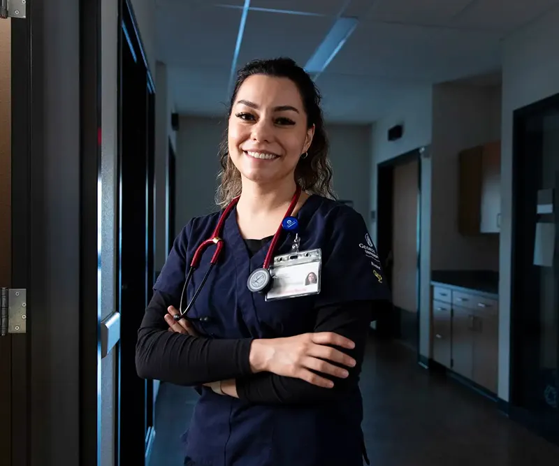 CRNA nurse laughs with a patient 